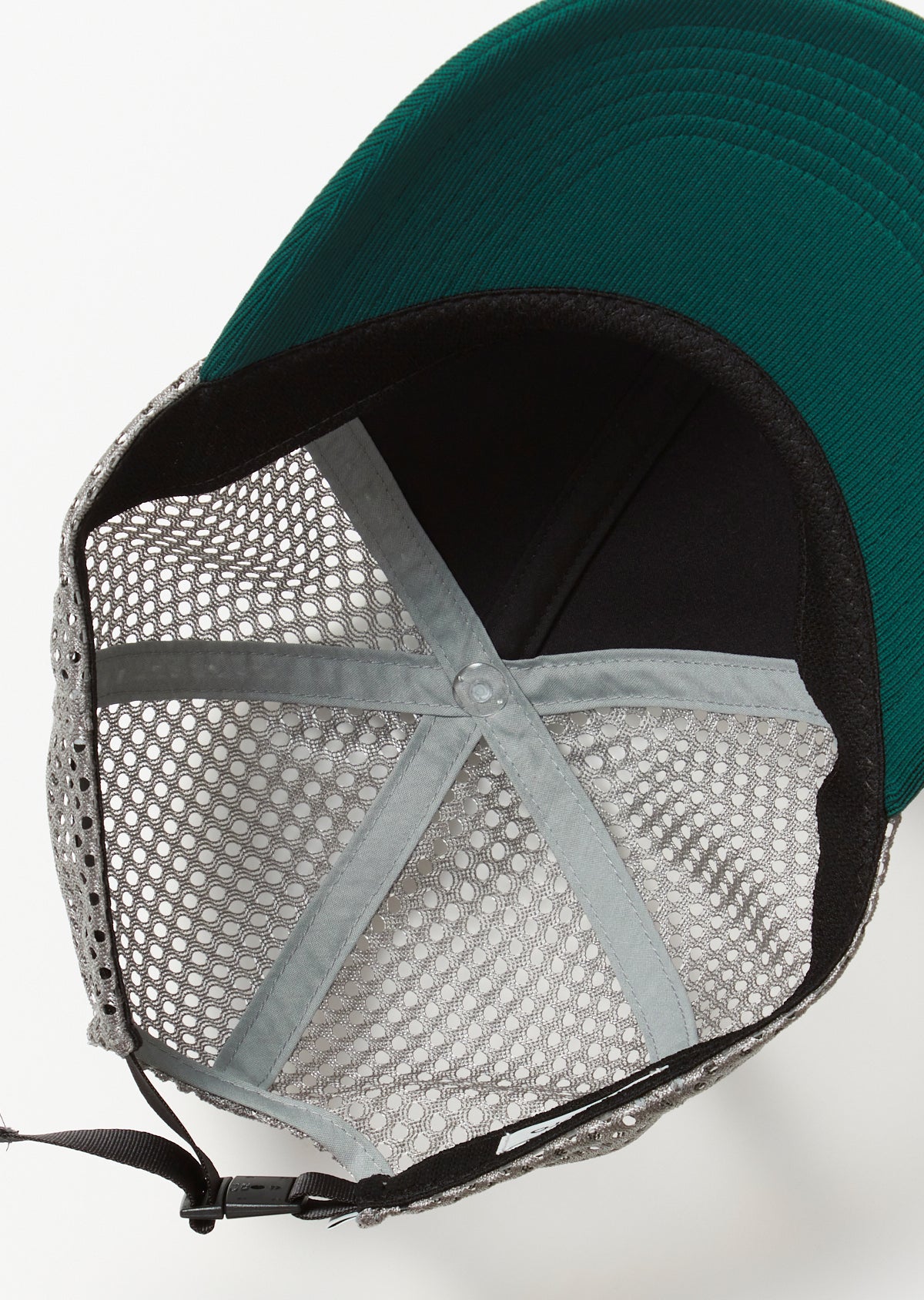 Underside of Rototo Jersey 6 Panel Mesh Cap in dark green