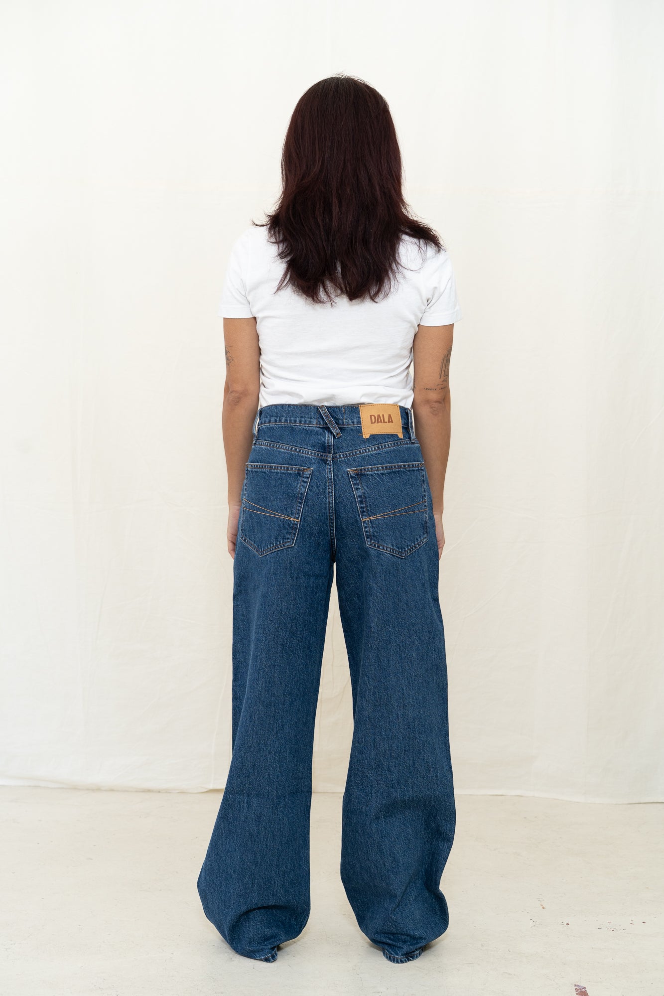 DALA Sling Jean in Flat Blue